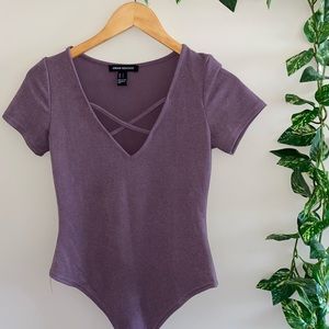Purple cris cross bodysuit